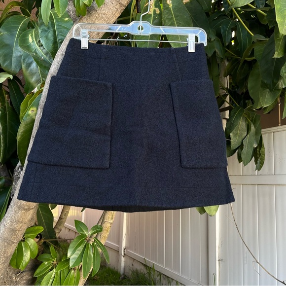 COS Aline Front Pocket Wool Mod Mini Skirt in Navy. - Picture 1 of 10